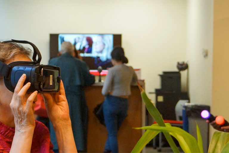 technology classes for seniors, seniors using virtual reality goggles