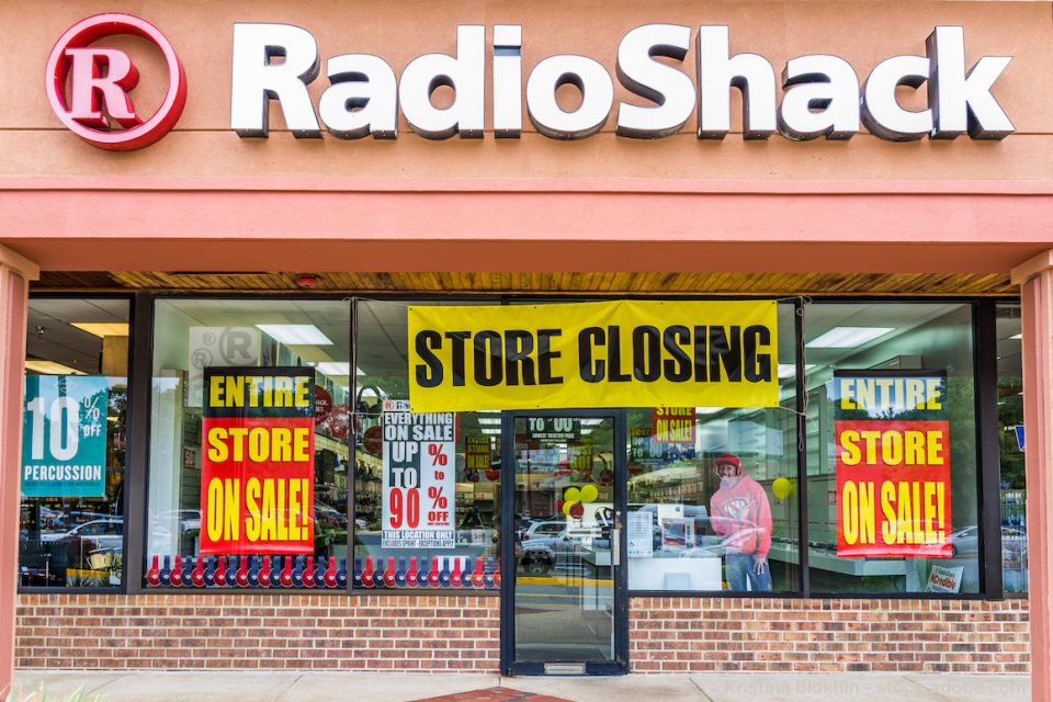 Radio Shack store entrance facade with closing sale sign