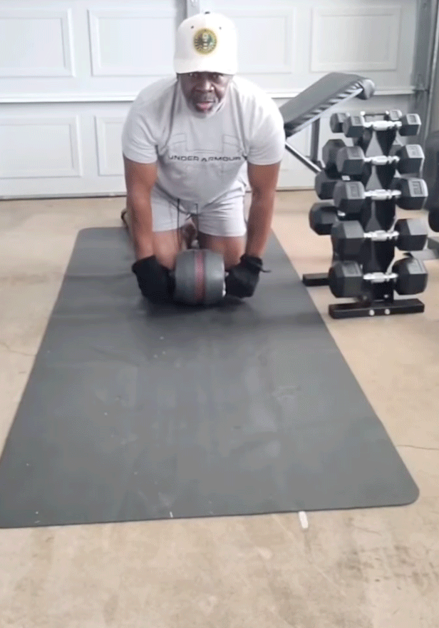 gif of senior African American man performing core exercise with ab roller